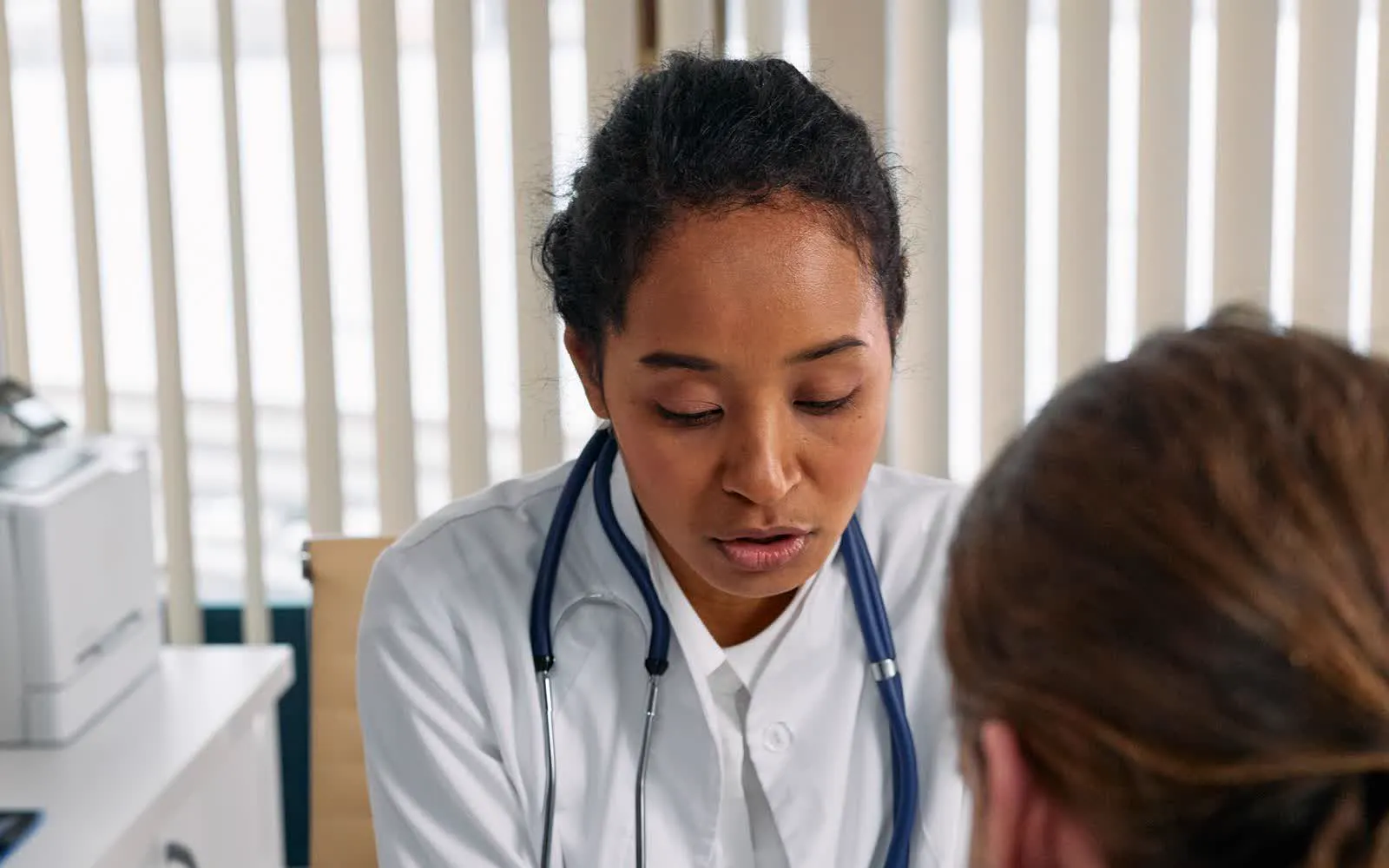 A doctor discussing care with a patient